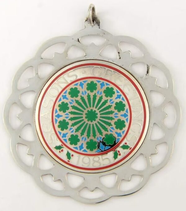 1985 Framed Seasons Greetings Sterling Silver Christmas Ornament by Lunt